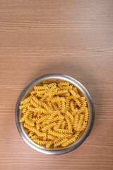 Raw pasta in bowl - macro detail