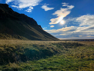 Pasture in Iceland with blue sky