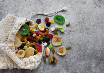 Different dried fruits and nuts in an eco bag