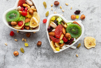 Bowls with various dried fruits and nuts