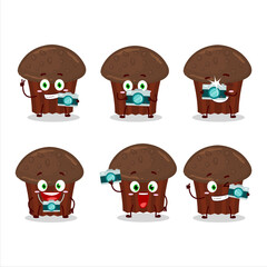 Photographer profession emoticon with chocolate muffin cartoon character