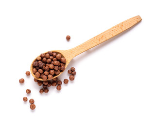 Spoon with chocolate corn balls on white background