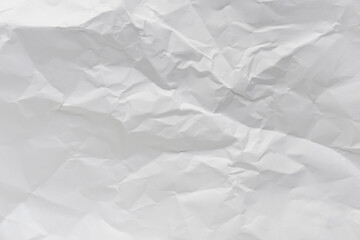 Obraz premium White crumpled paper texture background.