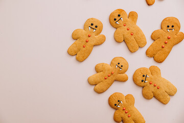 Halloween Gingerbread Cookies on black background, selective focus and blank space. creative Halloween background