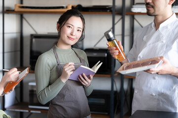 Image of a beautiful student attending a cooking class. Copy space available.