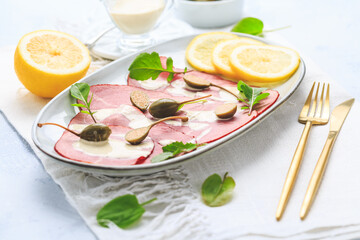 Vitello tonnato - Italian cuisine, sliced veal with tuna sauce as antipasto