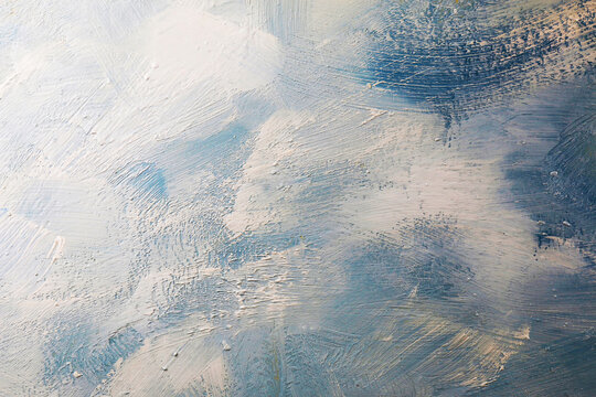 Texture materica dipinta su legno, con effetto spatolato in varie tonalit&agrave; di azzurro, blu e bianco; spazio per testo