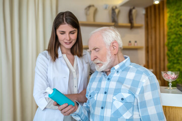 Mature man choosing a body lotion in a beauty shop