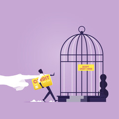 Debt trap-Forbidden or freedom of financial concept, Big hand push businessman with credit card in to birdcage metaphor of debt