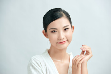 Beautiful Young asian Woman with Clean Fresh Skin look. Girl beauty face care