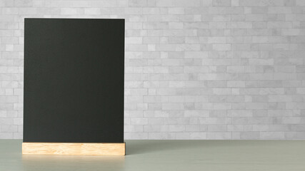 Blank menu blackboard on wooden table on white, copy space,write your message here.education and business concept