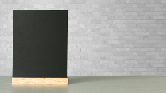 Blank menu blackboard on wooden table on white, copy space,write your message here.education and business concept
