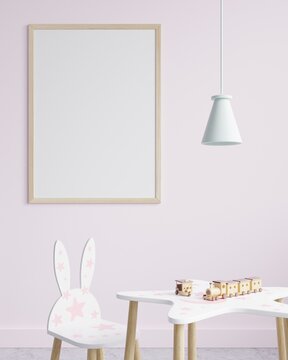 Mock up a photo frame on a pink wall in a kid's room with a hanging lamp on the side, decorated with a baby chair and a table with toys.3d rendering.