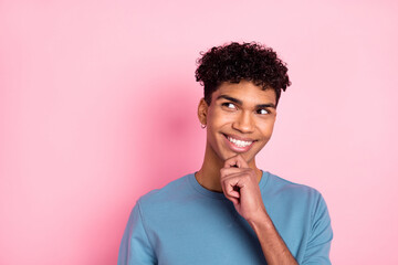 Photo of young black man happy positive smile think dream look empty space isolated over pastel color background