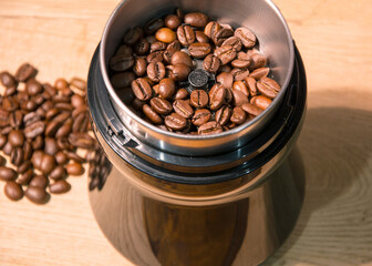 Coffee beans and grinder