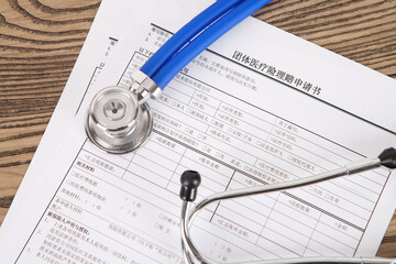 Stethoscope and medical claim form