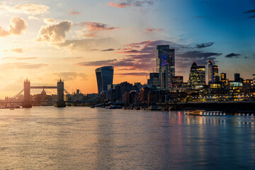 Sunset to night seamless view to the modern skyline of London, United Kingdom, with Tower Bridge...