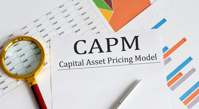 Paper with CAPM Capital asset pricing model on a table