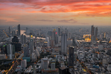 Fototapeta na wymiar Bangkok city skyline with sunset over the Chao Phraya river