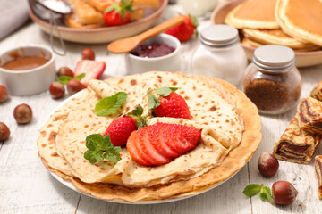 crepe with strawberry and chocolate sauce