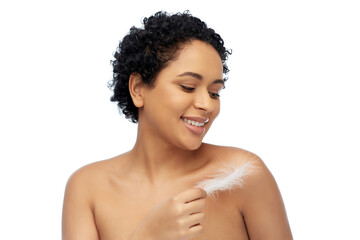 beauty and people concept - portrait of happy smiling young african american woman with bare...