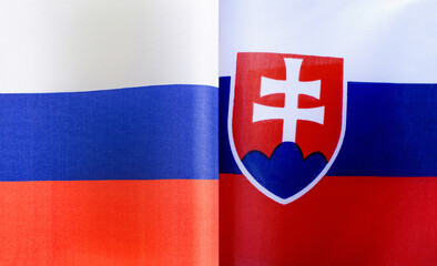 fragments of the national flags of Russia and Slovakia close-up