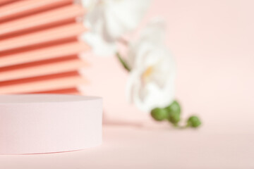 Podium stand pedestal for product presentation, coral pink mockup for branding. Modern packaging...