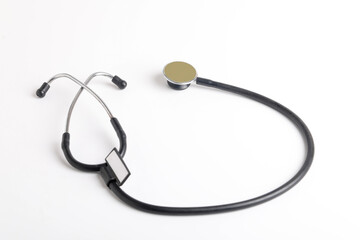 Black stethoscope on white background