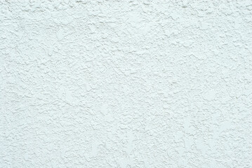 Plaster on a blue wall. Concrete wall texture close up.