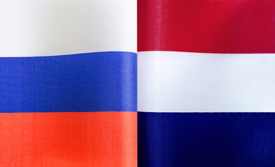 fragments of the national flags of Russia and the Netherlands close-up