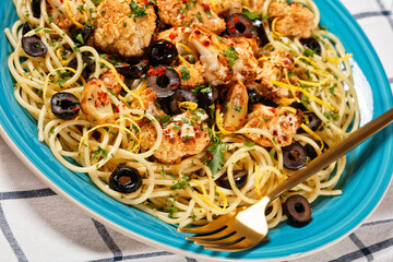 Cauliflower Pasta with black olives, top view