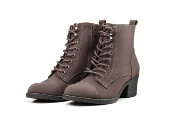 A pair of women's shoes of brown color with laces on a low heel isolated on a white background. Close-up, side view.