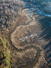 River and forest in Kazdanga, Latvia. Captured from above.