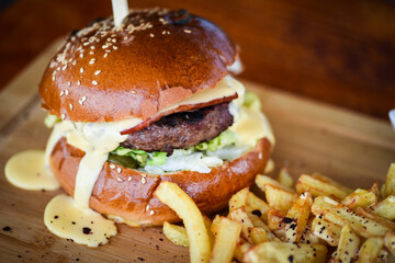 tasty delicious home made burgers with french fries