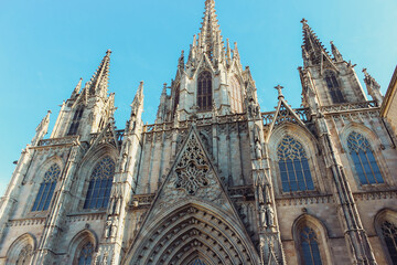 BARCELONA, SPAIN - OCT 24, 2019:Gothic Catholic Cathedral Facade Steeples Barcelona Catalonia Spain. This is the main spire.