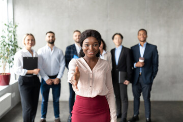 Black Business Lady Stretching Hand For Handshake In Office