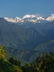 Scenic view on snow-capped Kangchenjunga in Himalaya mountain range seen from Pelling, Sikkim, India
