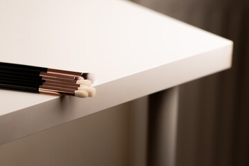 Set of eyeshadow brushes lying on a table