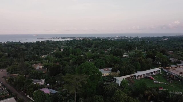 Aerial View of Island Shore Over Residential Area - S&atilde;o Tom&eacute; and Prince