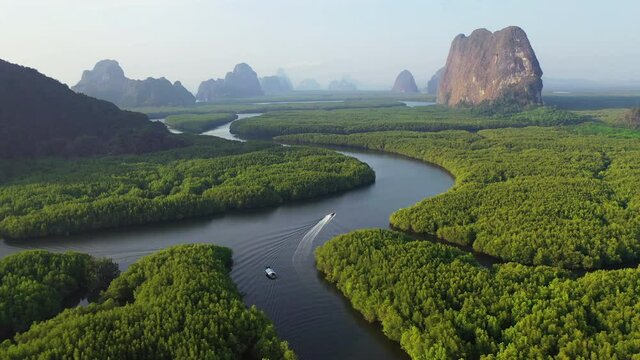Aerial view of Phang Nga bay with mountains at sunrise in Thailand.