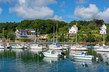 Fototapeta na wymiar Sailboats in the marina of Kerdruc on Aven river in Finistère, Brittany, France