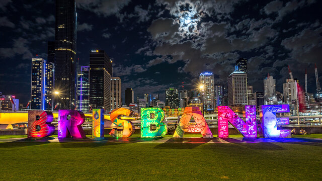 Brisbane, Australia - Mar 27, 2021: Illuminated Brisbane sign with the city in the background