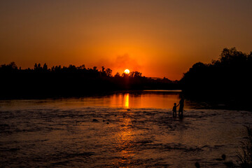 summer sunset over the river