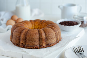 bundt cake and ingredients on a table