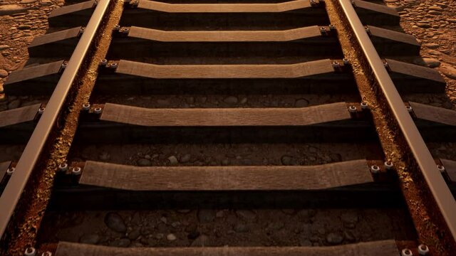An aerial view over an old and rusty railroad track in the wild west of America.