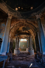 Fototapeta na wymiar Interior of dark creepy abandoned church. Old rotunda