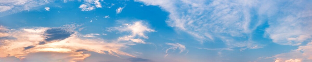 Obraz premium Dramatic panorama sky with cloud on sunrise and sunset time. Panoramic image.