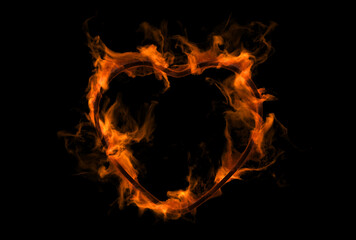 Burning heart. Fire and heart on a black background. Flame illustration.