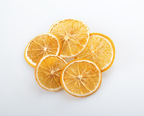 Round slices of dried orange, isolated on a white background