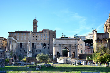 Fototapeta premium view to the roman forum - Septimius Severus Arch, saint Luca and Martina church, Senatorial Palace Capitoline Hill - Rome, Italy 